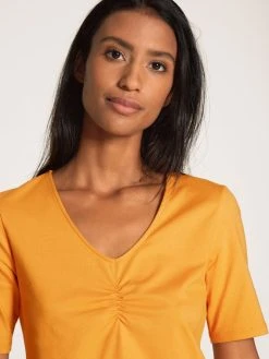 Calida Favourites Sunflower Kurzarm-Shirt 10 Calida Favourites Sunflower Kurzarm-Shirt -CALIDA-Shop Calida Favourites Sunflower Top kurzarm gelb 14558 038 3