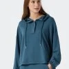 Schiesser Mix Lounge Oversized Hoodie 2 Schiesser Mix Lounge Oversized Hoodie -CALIDA-Shop Schiesser Mix Lounge Hoddie gruen blau 177343 817